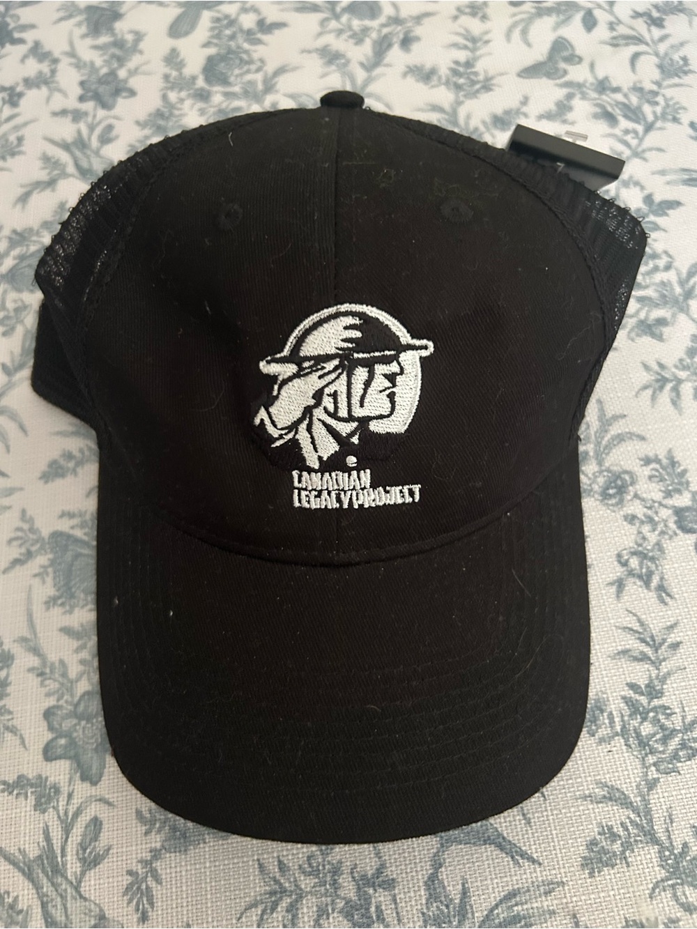 Canadian Legacy Project Black Mesh Back Trucker Cap with White Embroidered Logo